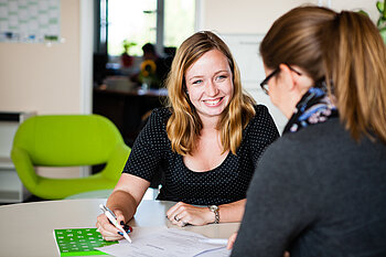 Colleagues in conversation 